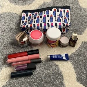 Esteé Lauder cosmetic bag with different makeup